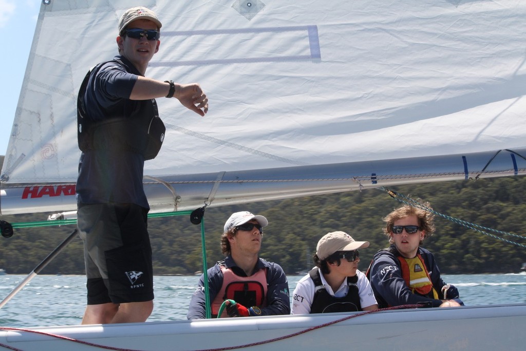 2010 winner Tim Coltman & crew from RPNYC checks his clock in the pre-match - photo by Tom Spithill - HARKEN International Youth Match Racing Championships © Tom Spithill